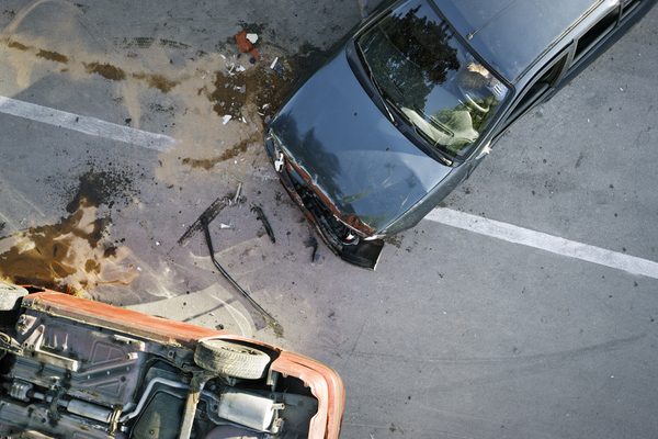 Elevated view of broken cars after accident.